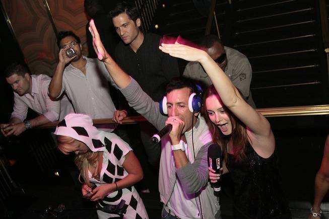 DJ Clinton Sparks parties with actress Leighton Meester at the Hard Rock Hotel.