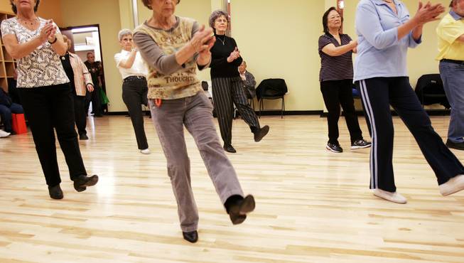 Seniors participate in a dance class during the Heritage Park grand opening in Henderson Saturday, January 30, 2010.