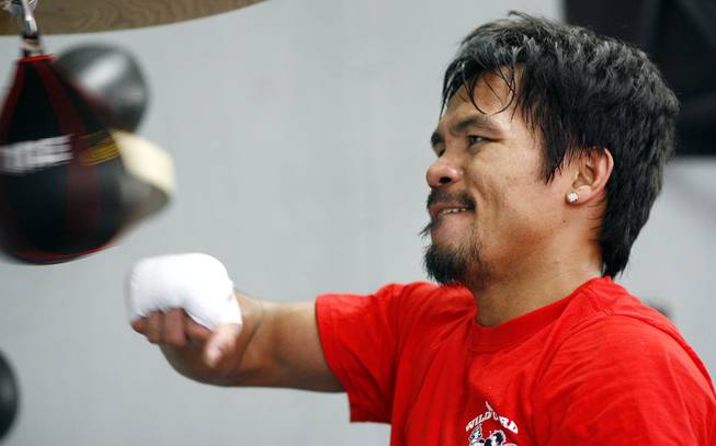 Manny Pacquiao works the bag during a workout at Wildcard Boxing Gym in Hollywood, Calif. on Feb. 1, 2010.