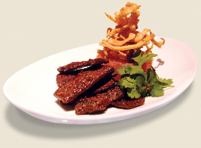 Strip House's beef jerky: a lowbrow snack turned scrumptious. 