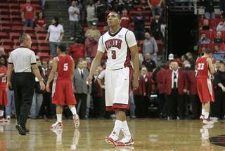 UNLV guard Anthony Marshall looks at the scoreboard as the final seconds tick away during the second half of their Mountain West Conference game against New Mexico Wednesday, Feb. 10, 2010, at the Thomas & Mack Center. The Lobos held off a late Rebel charge to win 76-66.
