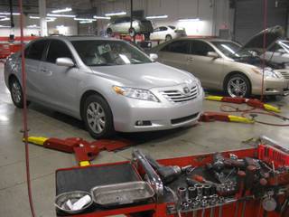 Mechanics at Findlay Toyota in Henderson repair recalled vehicles for sticky gas pedals and unsecured floor mats Wednesday, Feb. 10, 2010. 