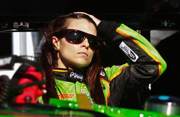 Danica Patrick stands by her car as she prepares for ...