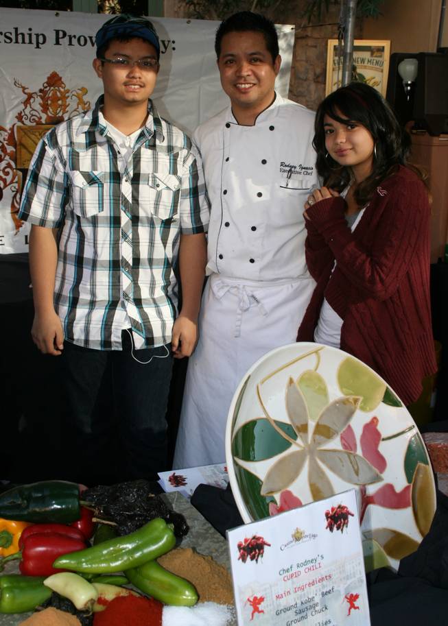 People's choice winner Chef Rodney Ignacio of Casino MonteLago poses with his family at the Lake Las Vegas Chili Cook-off. 