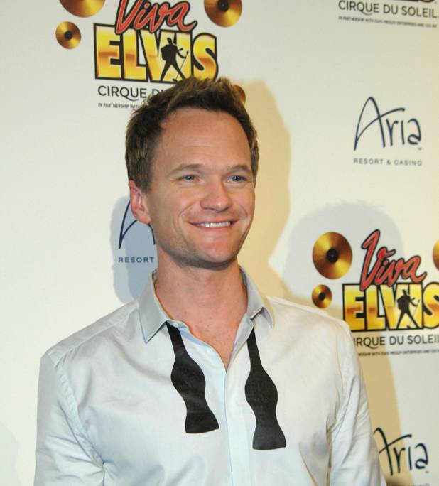 Neil Patrick Harris arrives on the blue carpet for the ...
