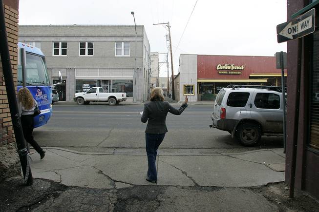 Sue Lowden waves goodbye to supporters as she leaves Elko during a campaign swing through northern Nevada Saturday, February 20, 2010.