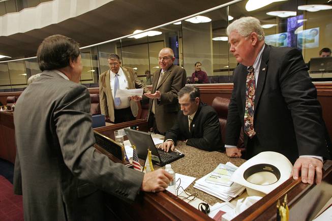 Republican Assemblymen, from left, Richard McArthur, Pete Goicoecha, Joe Hardy, James Settelmeyer and John Hambrick meet before the start of the second day of the legislative special session Tuesday, February 23, 2010 in Carson City.