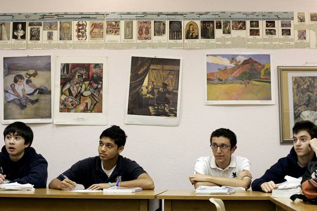 Juniors Troy Batugal, from left, Sanchay Gupta, Ajay Batra and Sterling Campbell listen to a lecture during AP European History class at the Meadows School in Summerlin Thursday, March 4, 2010.