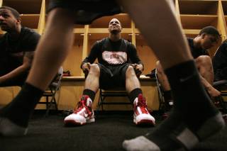 UNLV players Matt Shaw (left), Steve Jones and Tre'Von Willis get ready for practice Wednesday for the first round of the NCAA Basketball Championships at the Ford Center in Oklahoma City.