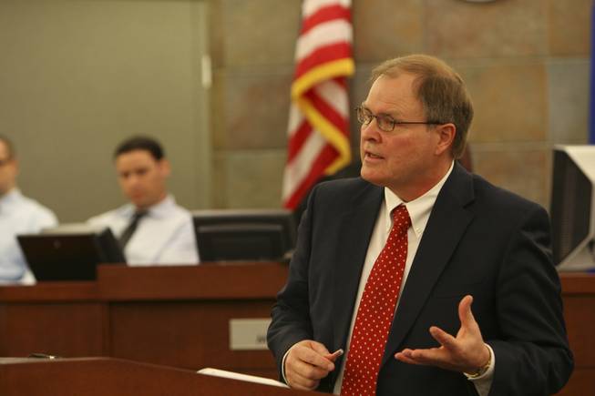 Chief Deputy District Attorney Scott Mitchell presents his opening arguments to the jury during the trial of Lacy Thomas, former CEO of University Medical Center, Tuesday, March 23, at the Regional Justice Center.