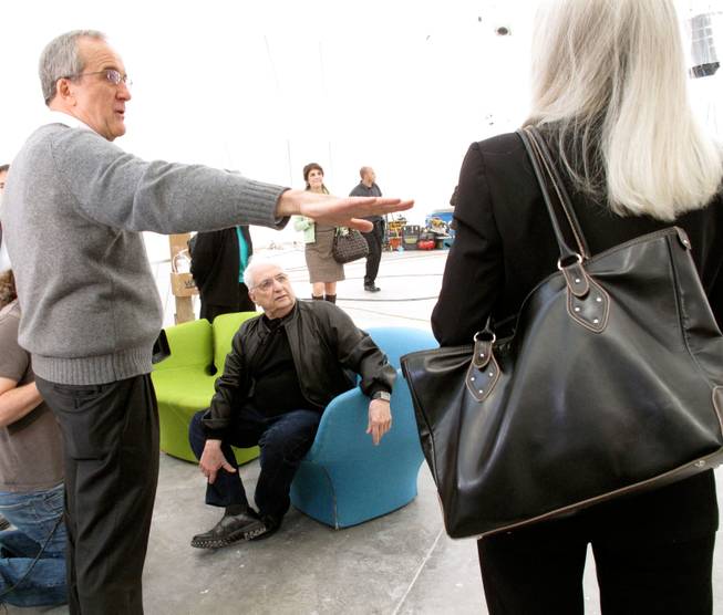 Larry Ruvo (left) and Libby Lumpkin (right) speak to renowned architect Frank Gehry (center) inside the Cleveland Clinic Lou Ruvo Center for Brain Health, which he designed.
