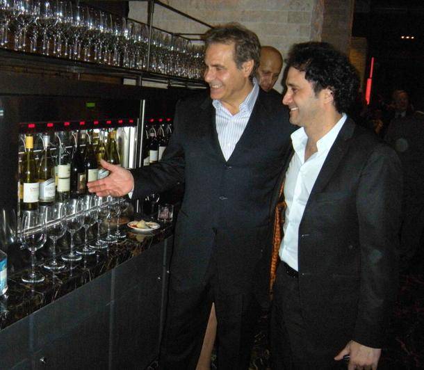 Rino Armeni and George Maloof check out the wines at Pips Cucina and Wine Bar at Aliante in November 2008.