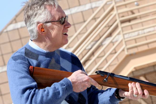 Sen. Harry Reid prepares to shoot his personal 12-gauge shotgun during the grand opening of the Clark County Shooting Park in Las Vegas Saturday, March 27, 2010.
