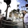 Treasure Island owner Phil Ruffin walks outside during a tour of the property Wednesday. Ruffin has invested $15 million in making the hotel appeal to a blue-collar audience, including adding a Gilley's saloon and a pizza joint across from the Mystere Theatre.