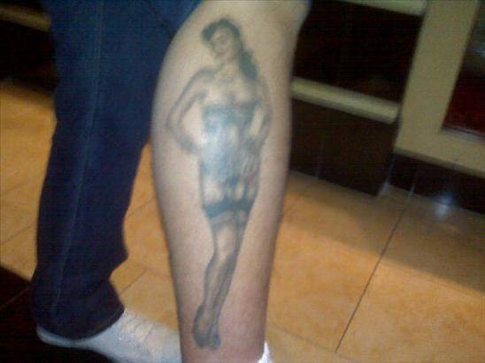 Dita Von Teese -- in tattoo form.