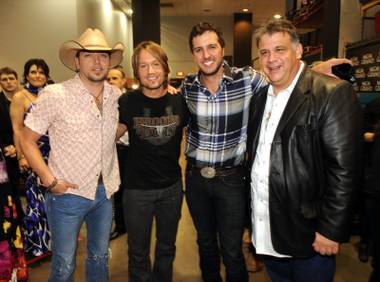 Jason Aldean, Keith Urban, Luke Bryan and Academy of Country Music Executive Director Bob Romeo backstage during ACM Presents: Brooks & Dunn - The Last Rodeo at MGM Grand Garden Arena on April 19, 2010.