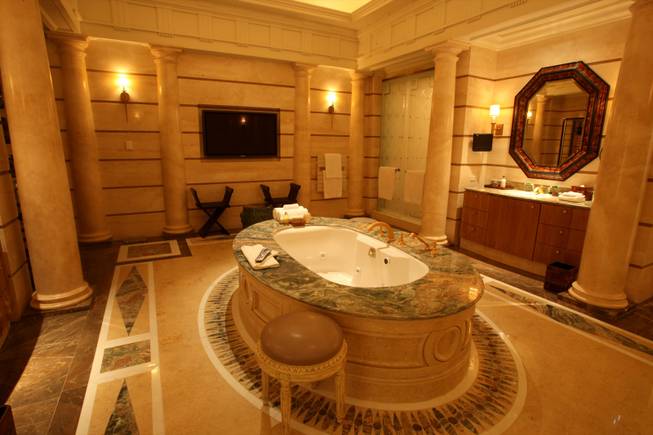 The Greek villa is one of three at Caesars Palace's Octavius Tower and is nearly 10,000 square feet. Shown here is the master bathroom.