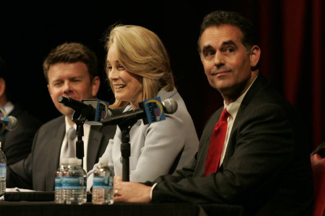 Sue Lowden, seated next to Danny Tarkanian, right, answers a question April 30 during a Republican debate sponsored by conservative talk radio station KDWN.