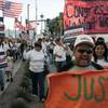 Activists march down Las Vegas Boulevard on Saturday during a rally for immigration reform.