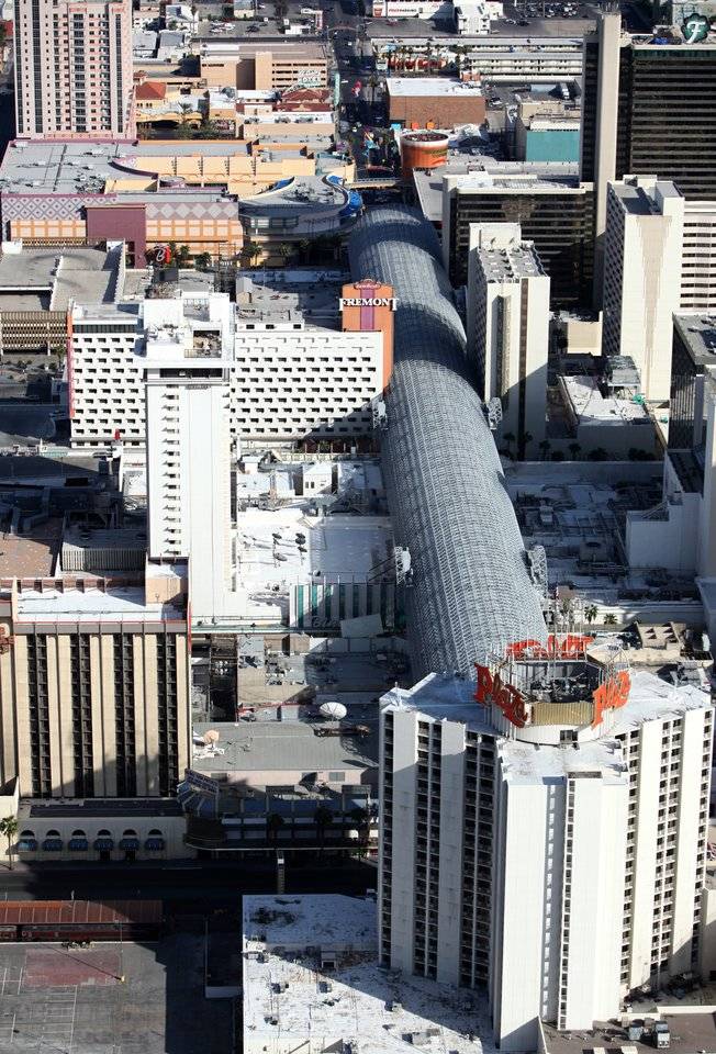 The Fremont Street Experience and Plaza Hotel in downtown Las Vegas are shown.