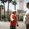 A handbiller outside the Flamingo just north of Flamingo Road on the Strip passes out cards for an escort service in May 2010. 
