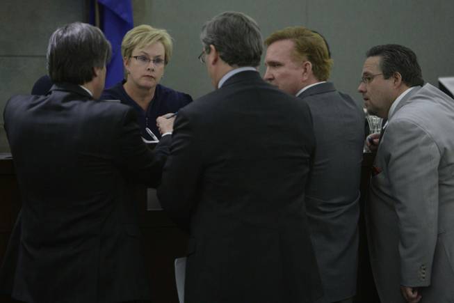 District Court Judge Jessie Walsh confers with attorneys after a jury found two companies that made and distributed the anesthetic propofol used at Desert Shadow Endoscopy Center liable on multiple counts at the Regional Justice Center Wednesday, May 5, 2010. 