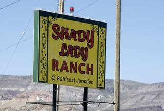 A sign for the Shady Lady Ranch brothel in Nye County. The Shady Lady, off U.S. Highway 95 about 30 miles north of Beatty, was the first brothel to hire a male prostitute. Nye County is one of 11 Nevada counties where prostitution is legal.