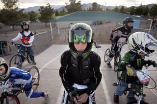 Cooper Brow, 9, waits to ride during an open practice session Wednesday at the Boulder City BMX track.