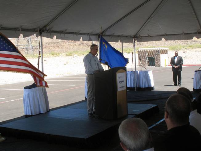 Sen. Harry Reid speaks Saturday at a "flip the switch" ceremony for a new solar power plant at the Southern Nevada Water Authority's water treatment facility in Henderson.