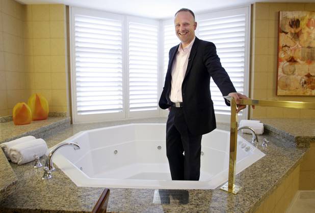 Arik Knowles, vice president of hotel operations, in a renovated penthouse suite at the Tropicana on Monday. Eight of the nine 2,000-square-foot suites have their own Jacuzzi. The property is going through its first major renovation in nearly 25 years.