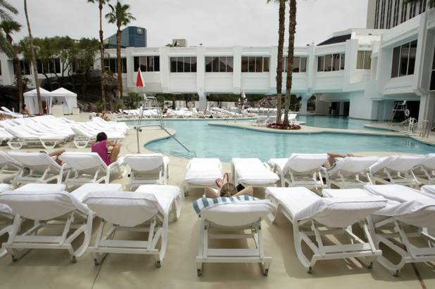 Sunbathers enjoy the pool area at the Tropicana on Monday. The property is going through its first major renovation in nearly 25 years.