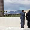 Robert Boykin Jr., left, Thomas Stilley and Lizz Stilley of Crescent Real Estate Equities stand outside of the Hughes Center, a premier Las Vegas office park.