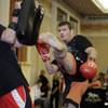 Michael Bisping, right, practices kicks during workouts for UFC 114 on Thursday at the MGM Grand. UFC 114 will be held Saturday at the MGM Grand Garden Arena.