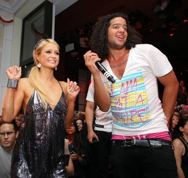Paris Hilton and LMFAO at Surrender’s grand opening weekend in Encore on May 30, 2010.
