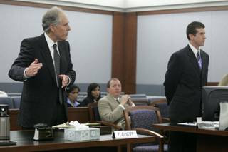 Attorney Richard Wright makes a case to keep his client, Dr. Dipak Desai, out of custody after Desai was indicted by a grand jury Friday, June 4, 2010. On the right is deputy district attorney Michael Staudaher. 