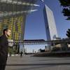 A bellman stands in front of Aria. Long waits to check in are among the complaints voiced by online reviewers about the hotel.