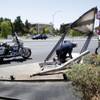 Reginald Lovett, an employee of Outdoor Promotions, disconnects electricity from a bus shelter after a pickup truck ran into the shelter on Rancho Drive just north of Lake Mead Boulevard Monday, June 21, 2010. The driver of the truck, a person waiting at the bus shelter and the driver of another vehicle were transported to the hospital, police said.