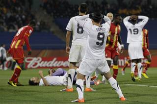 United States' Herculez Gomez, center foreground, reacts after a missed scoring opportunity during the World Cup round of 16 soccer match between the United States and Ghana at Royal Bafokeng Stadium in Rustenburg, South Africa, Saturday, June 26, 2010