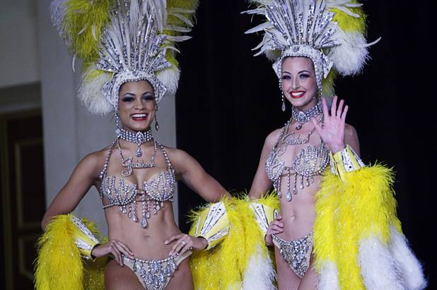 Jubilee showgirls arrive for a pre-fight "news conference" featuring Shaquille O'Neal and boxer Shane Mosley at Caesars Palace Thursday, July 8, 2010. The exhibition match in the open-air Roman Plaza at Caesars Palace Friday will be filmed for the ABC television series "Shaq Vs."
