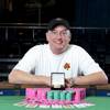 Frank Kassela, a poker pro from Memphis, Tenn., poses with the first of two World Series of Poker bracelets he won this summer, July 12, 2010. 