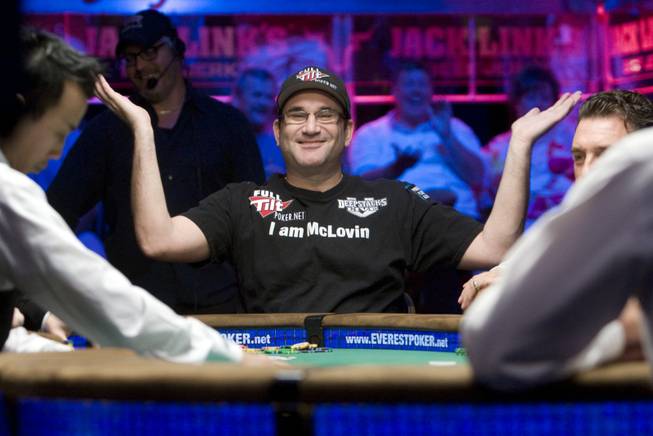 Mike "The Mouth" Matusow, wearing a Full Tilt Poker.net logo, celebrates a winning hand July 5 at the World Series of Poker.