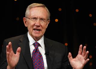 Sen. Harry Reid answers questions during the Netroots Nation convention Saturday at the Rio. Reid faces Republican and Tea Party favorite Sharron Angle this November in his bid to keep representing Nevada.