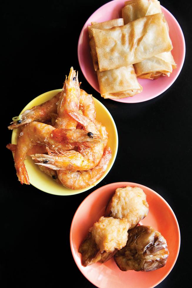 From the top, Cathay House's egg rolls, salt-baked shrimp and stuffed eggplant.