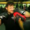UFC heavyweight Roy Nelson hits the pads during a workout July 28, 2010. Nelson will face Junior dos Santos on August 7th in a number one contender eliminator bout.