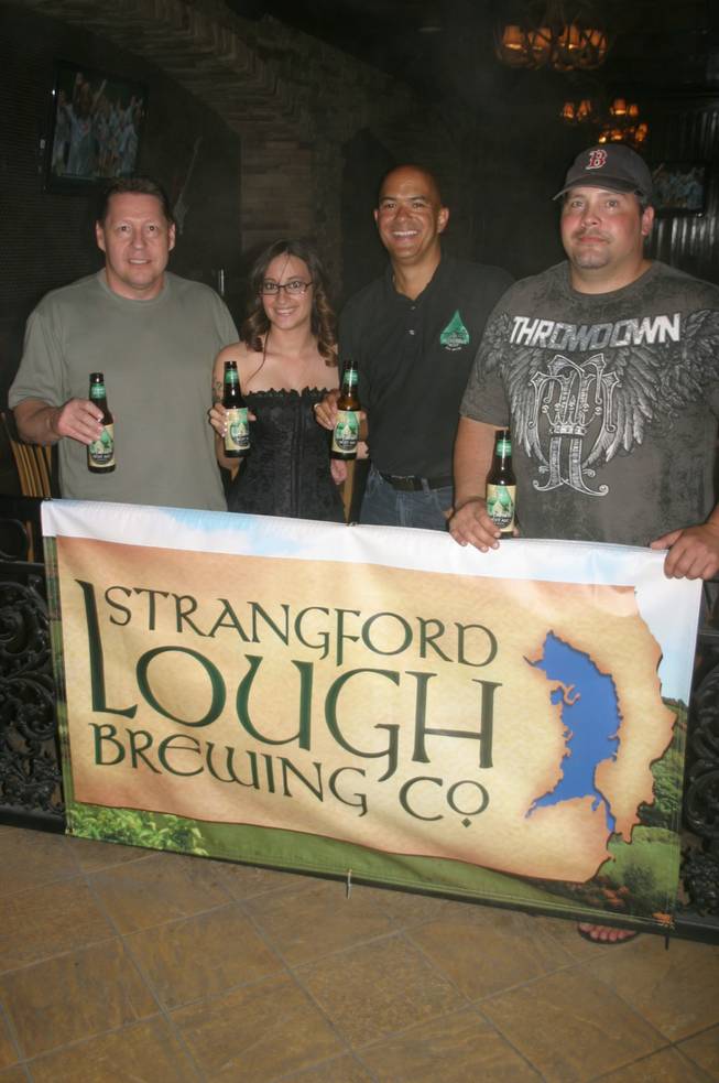 Strangford Lough Brewing Co.'s reps, from left, Darrell Way, Amberlyn Brackin, Ken O'Neill and Greg Joiner offered samples of its beer, which will be manufactured in Las Vegas. 