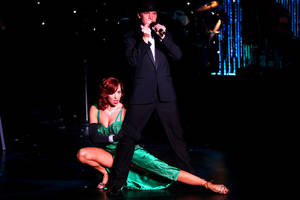 Tara Palsha and Tom Lowe perform during the opening of "Vegas! The Show" at Miracle Mile Shops at Planet Hollywood.