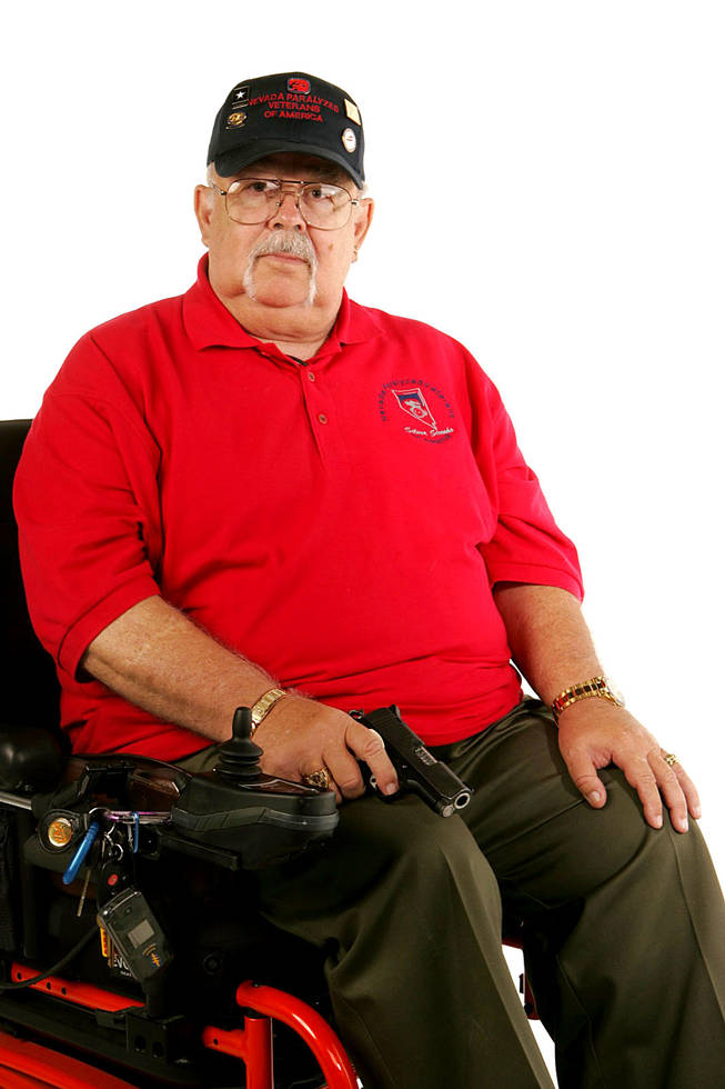 Mike Stern, a Vietnam veteran, says he carries a firearm because criminals might view him as an easy target. Wheelchair users he knows have been crime victims. 