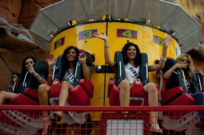 Contestants of the 2010 Miss Universe competition enjoy the rides ...