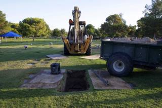 coroner buried exhumes mortuary