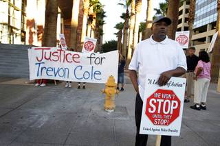 Former state assemblyman Wendell Williams protests with members of community action group A League of Action in front of the Regional Justice Center before a coroner's inquest on the death of Trevon Cole on Friday, Aug. 20, 2010. 